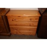 A modern pine four drawer chest