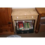 A stripped pine hall table fitted single drawer