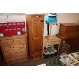A pine single door cupboard fitted single drawer