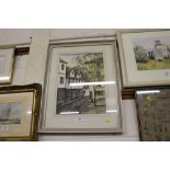 A framed and glazed watercolour depicting Elm Hill