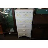 A white painted chest fitted five drawers