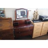 An Edwardian mahogany mirror back dressing chest fitted three drawers