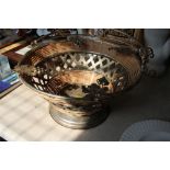 A silver plated swing handle fruit bowl