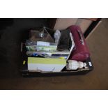 A box of various miscellaneous items and a terrari