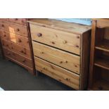 A modern pine chest fitted three drawers