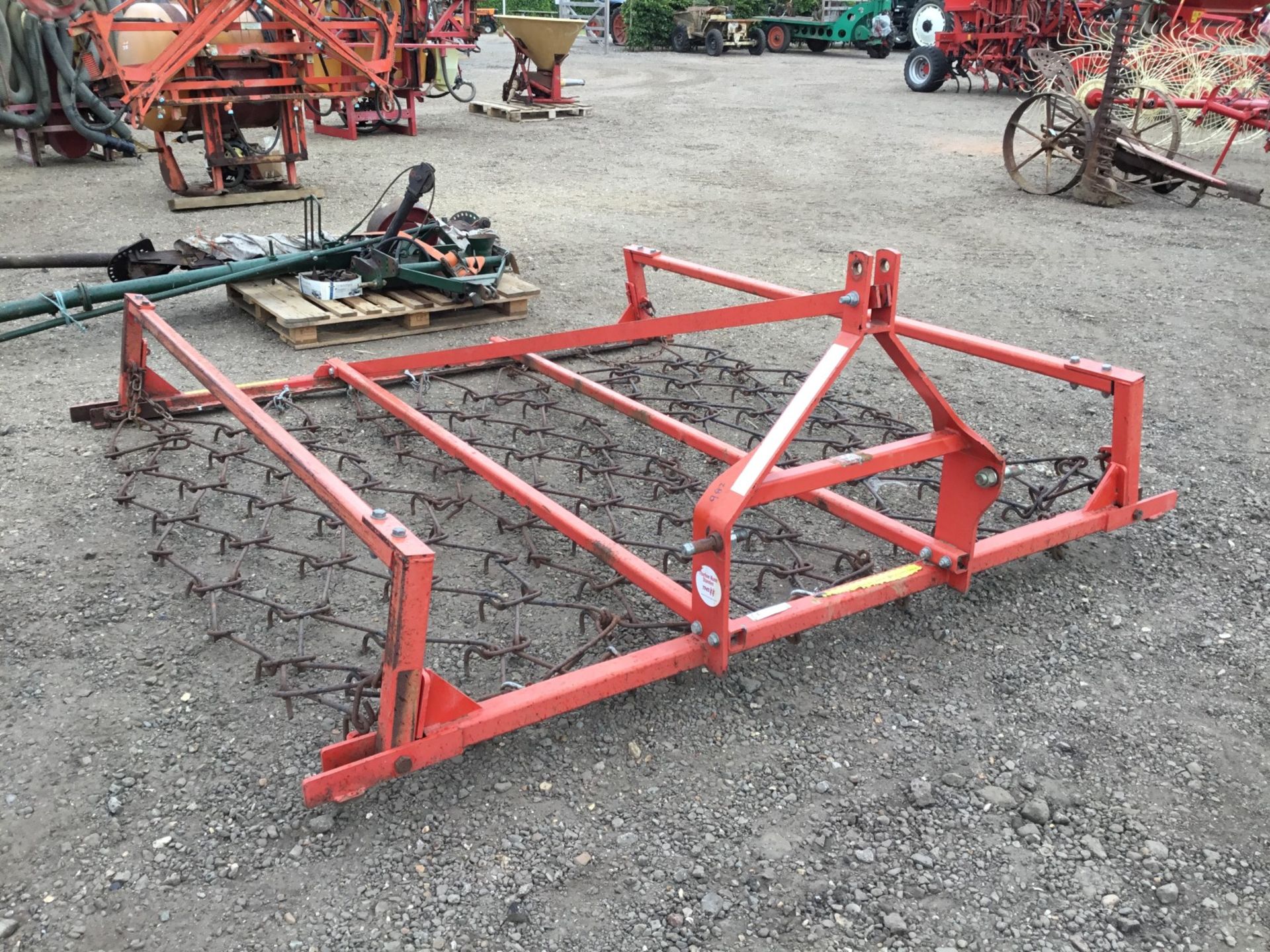 Parmiter 3m Pro mounted chain harrows with manual fold wings.