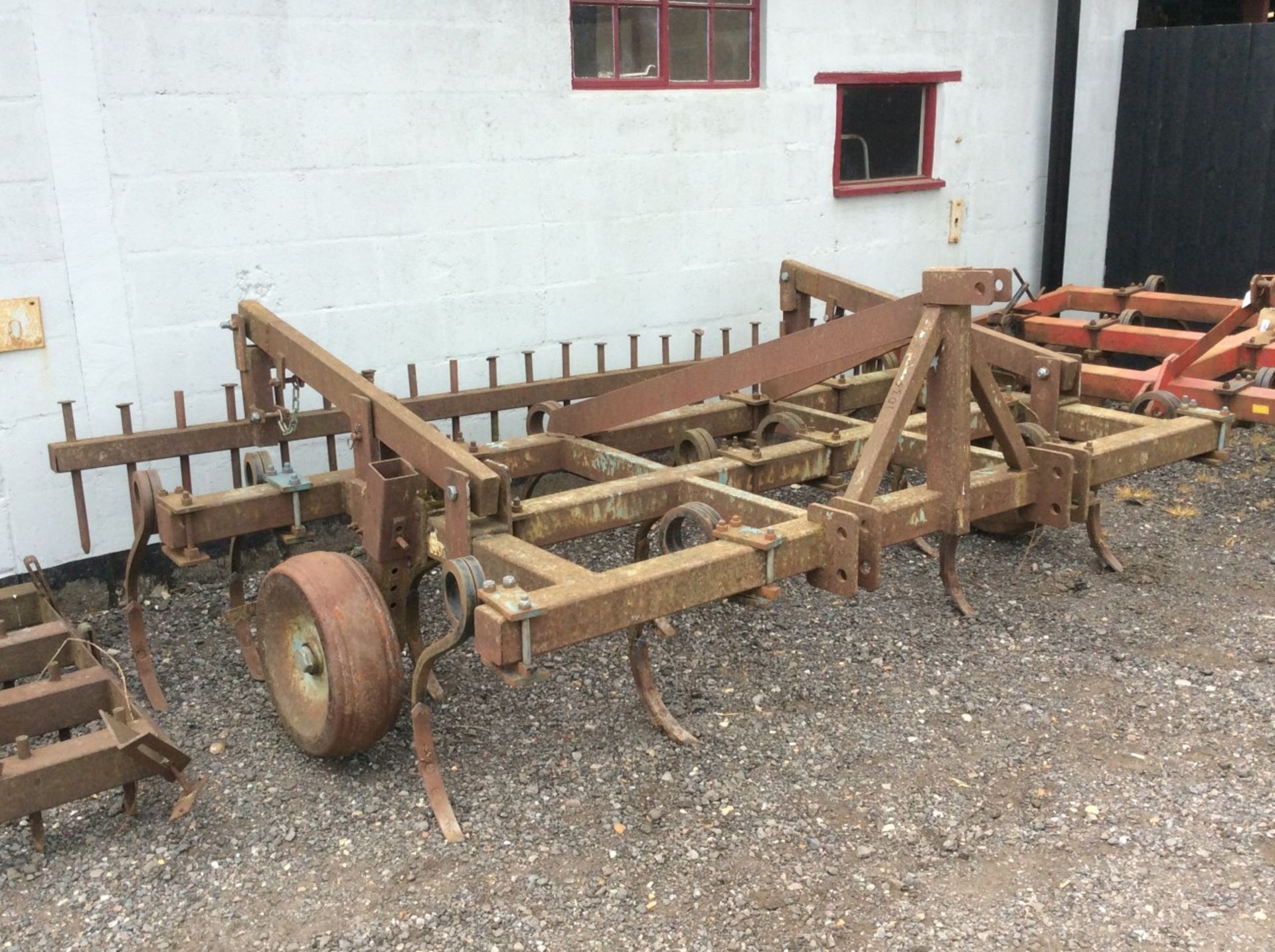 Smiths 3m pigtail cultivator with following harrow and depth wheels.