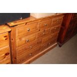 A pine multi drawer chest
