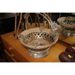A silver plated swing handled fruit bowl