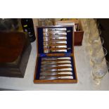 A set of six each silver plated fish knives and fo