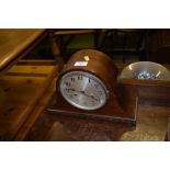 A mahogany cased two hole mantel clock; and a wood