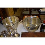 A pair of large silver plated twin handled coolers