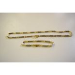 A 14ct gold bi-metal necklace and matching bracele