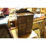 A reproduction mahogany CD chest