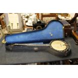 A Dulcet banjo in carrying case
