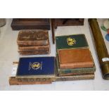 A collection of various leather bound books to inc