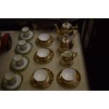 A Victorian Davenport Imari patterned coffee set