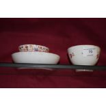 A 19th Century Newhall china tea bowl and saucer;