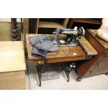 A Singer sewing machine table - sold as collector'