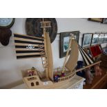 A child's wooden pirate ship