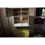 A vintage kitchen cabinet