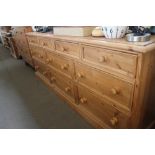 A pine multi drawer sideboard