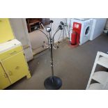 A metal hat and coat stand