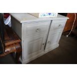 A pair of bedside cupboards fitted single drawer