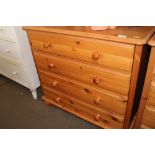 A modern pine chest fitted four drawers