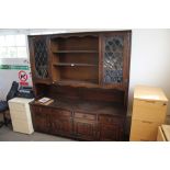 An Old Charm dresser raised on covered base fitted