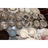 A quantity of stainless steel teaware items