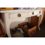 A white painted dressing table fitted three drawer