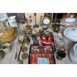 A quantity of metal ware items to include clocks;
