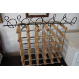 A wooden and metal wine rack and a bottle holder