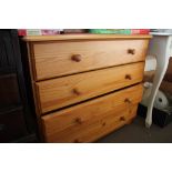 A modern pine chest fitted four drawers