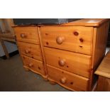 A pair of three drawer bedside chests