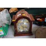 A Woodford three hole mantel clock