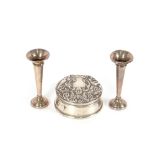 A pair of small silver trumpet shaped spill vases,
