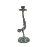 An Art Deco design polished metal candle holder, i