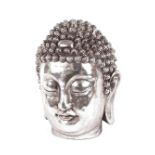 A silvered Buddha head ornament, 45cm high