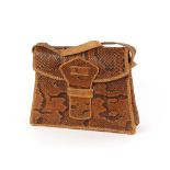 A small vintage snakeskin handbag