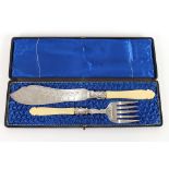 A pair of Victorian plated fish servers, with