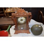An early 20th Century two hole mantel clock