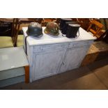 A white painted two drawer sideboard