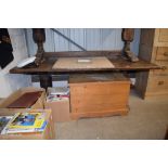 A large heavy oak refectory table