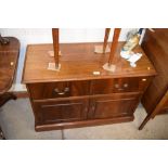 A reproduction mahogany side cabinet with drop fro