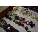 A quantity of various glass paperweights to includ