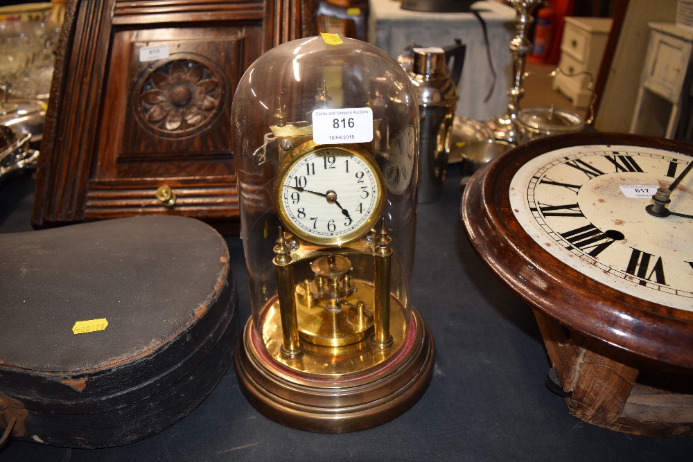 An anniversary clock under glass dome