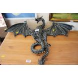 A wall hanging dragon figure