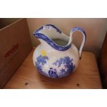 A Doulton blue and white jug